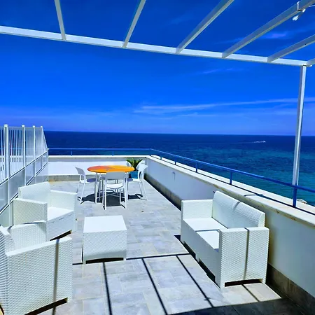 Апартаменты Sunset Exclusive Waterfront Shared Infinity Pool & Private Sea Access Санта-Флавия